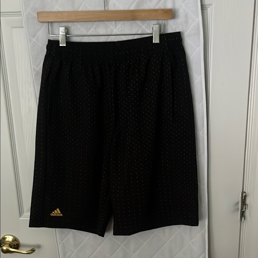 NWT youth adidas Black Athletic Shorts with Gold Logo, subtle polka dot pattern